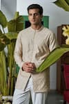 Buy_Philocaly_Beige Chanderi Embroidered Thread Shish Short Kurta _at_Aza_Fashions