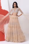 Buy_MEHAK SHARMA_Peach Tulle Embroidery Cutdana Blouse Round Tropical Cape And Lehenga Set _at_Aza_Fashions