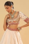 Sheetal Batra_Ivory Blouse And Lehenga Rawsilk Embroidery Kirandori Leaf Neck Sidra Set _Online