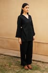 Shop_RAAS LIFE_Black Merino Wool Solid V Neck Pansy Wrap Top _Online_at_Aza_Fashions