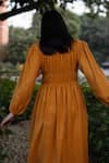 RAAS LIFE_Yellow Merino Wool Solid Round Sunflower Smocked Midi Dress _Online_at_Aza_Fashions