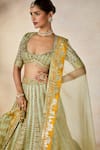 Shop_Masaba_Green Lehenga Raw Silk Embellishment Amaltas Plunge Kashni Bridal Set _Online_at_Aza_Fashions