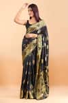 Samyukta Singhania_Black Pure Silk Floral Woven Paisley Motif Saree With Running Blouse _Online_at_Aza_Fashions