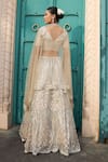 Shop_Tasuvure Indes_Ivory Net Embroidered Bead Round Lehenga Set _at_Aza_Fashions