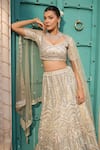 Buy_Tasuvure Indes_Ivory Net Embroidered Bead Round Lehenga Set _Online_at_Aza_Fashions