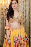 Foram Patel_Yellow Organza Print Floral Paan Neck Pleated Lehenga Set _at_Aza_Fashions