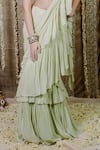 Foram Patel_Green Georgette Pre-draped Ruffle Saree With Cowrie Bloom Embellished Blouse _Online_at_Aza_Fashions