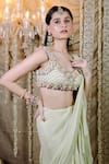 Shop_Foram Patel_Green Georgette Pre-draped Ruffle Saree With Cowrie Bloom Embellished Blouse _Online_at_Aza_Fashions