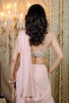 Shop_Foram Patel_Peach Solid Pre-draped Tiered Ruffle Saree With Cowrie Embellished Blouse _at_Aza_Fashions