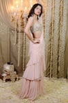 Foram Patel_Peach Solid Pre-draped Tiered Ruffle Saree With Cowrie Embellished Blouse _Online_at_Aza_Fashions