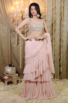 Buy_Foram Patel_Peach Solid Pre-draped Tiered Ruffle Saree With Cowrie Embellished Blouse _Online_at_Aza_Fashions