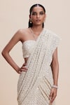 Kangana Trehan_Ivory Pure Georgette Embellished Sequin Sweetheart Pre-draped Saree With Blouse _at_Aza_Fashions