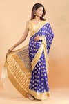 Samyukta Singhania_Blue Pure Handloom Cotton Chiffon Woven Contrast Hem Saree With Running Blouse _at_Aza_Fashions