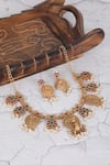 Shop_Auraa Trends_Gold Plated Stone Embellished Carved Peacock Choker Set _at_Aza_Fashions