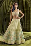 Samyukta Singhania_Yellow Blouse And Lehenga Silk Hand Embroidery Floral Sweetheart Patchwork Set _Online_at_Aza_Fashions