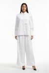 Buy_AK-OK_White Cotton Embroidery Eyelet Collar Neck Shirt And Flared Trouser Co-ord Set _at_Aza_Fashions