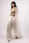 Buy_AK-OK_Ivory Cotton Embroidery Abstract Swerve Lapel Long Coat And Flared Trouser Set _Online_at_Aza_Fashions