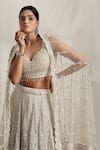 Buy_HOUSE OF SUPRIYA_Ivory Shimmer Net Embroidered 3d Flower Detailed Bridal Lehenga Blouse Set _Online_at_Aza_Fashions