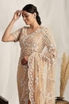 Shop_HOUSE OF SUPRIYA_Peach Shimmer Net Embroidered Pearl V Neck Scallop Hem Saree With Blouse _Online_at_Aza_Fashions