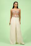 Buy_Rishi and Soujit_Ivory Crepe Embroidered Thread Cutwork Corset And Pant Set _at_Aza_Fashions