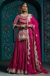 Buy_MONK & MEI BY SONIA ANAND_Fuchsia Velvet Embroidered Gota V-neck Butti Work Lehenga Kurta Set _at_Aza_Fashions