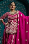 Shop_MONK & MEI BY SONIA ANAND_Fuchsia Velvet Embroidered Gota V-neck Butti Work Lehenga Kurta Set _Online_at_Aza_Fashions