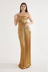 Buy_Cham Cham_Gold Stretch Knit Foil Embellishment Stones Straight Metallic Gathered Gown _at_Aza_Fashions