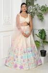 Buy_VRIDHI SOMAANI_Ivory Raw Silk Applique Floral Sweetheart Sienna Lehenga Set _at_Aza_Fashions