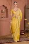 Buy_HOUSE OF KÀRMÀH_Yellow Tissue Embroidered Cutdana V Neck Chanderi Saree With Blouse _at_Aza_Fashions