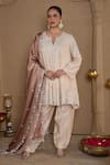 Buy_HOUSE OF KÀRMÀH_Gold Dupion Silk Embroidered Floral Notched Satin Kurta Pant Set _at_Aza_Fashions