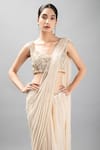 Kanj by Priyanka A Sakhuja_Ivory Chiffon Silk Embroidered Rohana Pearl Scatter Pre-draped Saree With Blouse _at_Aza_Fashions