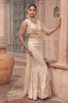 Laxmishriali_Gold Saree And Blouse Satin & Net Embroidered Cutdana & Sequin Pre-draped Set _Online_at_Aza_Fashions