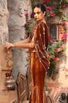 Ajiesh Oberoi_Gold Velvet Embroidered Beads Leaf Back Cowl Draped Blouse With Sharara _at_Aza_Fashions