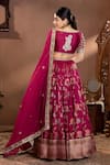 Shop_wildflower by krishna_Wine Silk Woven Floral Scoop Neck Rosette Pattern Lehenga Set _at_Aza_Fashions