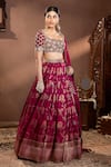 Shop_wildflower by krishna_Wine Silk Woven Floral Scoop Neck Rosette Pattern Lehenga Set _Online_at_Aza_Fashions