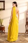 Shop_wildflower by krishna_Yellow Pure Crepe Embroidered Sequins And Cutdana Pre-draped Saree With Blouse _at_Aza_Fashions