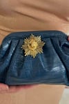 Buy_ADWITA BAGS & JEWELS_Blue Brooch Lion Textured Pouchette Bag _Online_at_Aza_Fashions