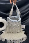 Shop_Kainiche by Mehak_Silver Sequin Zoya Fringed Embellished Potli Bag _at_Aza_Fashions