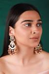 Buy Riana Jewellery Pink Pearls, Stones Floral Carved Long Dangler Earrings at Aza Fashions Buy_Riana Jewellery_Pink Pearls, Stones Floral Carved Long Dangler Earrings _at_Aza_Fashions