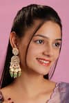 Buy Riana Jewellery Green Pearls, Stones, Beads Floral Carved Jadau Earrings at Aza Fashions Buy_Riana Jewellery_Green Pearls, Stones, Beads Floral Carved Jadau Earrings _at_Aza_Fashions