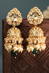 Shop Riana Jewellery Gold Plated Floral Carved Jadtar Stone Jhumkas at Aza Fashions Shop_Riana Jewellery_Gold Plated Floral Carved Jadtar Stone Jhumkas _at_Aza_Fashions
