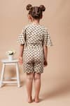 Shop Petite Pomme Beige Cotton Reindeer Whisper Print Wrap Top And Shorts at Aza Fashions Shop_Petite Pomme_Beige Cotton Reindeer Whisper Print Wrap Top And Shorts _at_Aza_Fashions