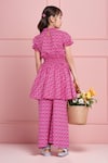Shop Petite Pomme Pink Cotton Floral Print Smocked Waist Tunic And Pant Set at Aza Fashions Shop_Petite Pomme_Pink Cotton Floral Print Smocked Waist Tunic And Pant Set _at_Aza_Fashions