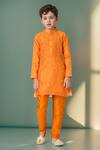 Petite Pomme_Orange Chanderi, Crepe Zari Pintuck Butta Kurta Set _at_Aza_Fashions