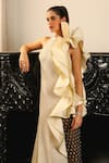 Supria Munjal_Off White Crepe (100% Polyester) Embellished Sequin Halter Wavy Draped Gown _at_Aza_Fashions