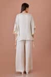 DILNAZ_Beige Net V Neck Solid Jumpsuit With Kaftan _Online_at_Aza_Fashions