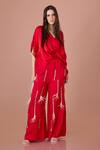 Buy_DILNAZ_Red Blended Satin V Neck Latkan Detailed Kaftan _at_Aza_Fashions