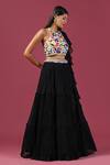 Buy_Two Sisters By Gyans_Black Georgette Embroidered Sequins Tiered Lehenga Set With Flower Blouse _at_Aza_Fashions