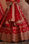 Manvi Kapoor_Red Raw Silk Embroidered Cutdana Plunge Mira Floral Vine Bridal Lehenga Set _Online_at_Aza_Fashions