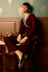 Shop_Reeti Arneja_Maroon Micro Velvet Hand Embroidered Bead Lapel V Sangria Front Tie-up Jumpsuit _at_Aza_Fashions